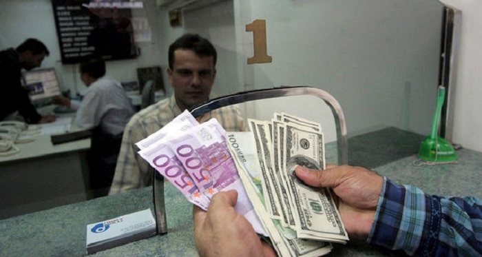 Turkish Lira tumbles to new record low against dollar